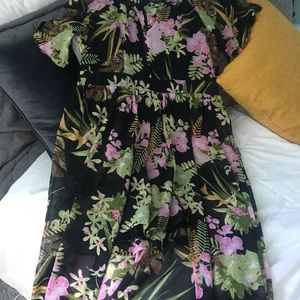 Floral short romper with cape in back. Almost new